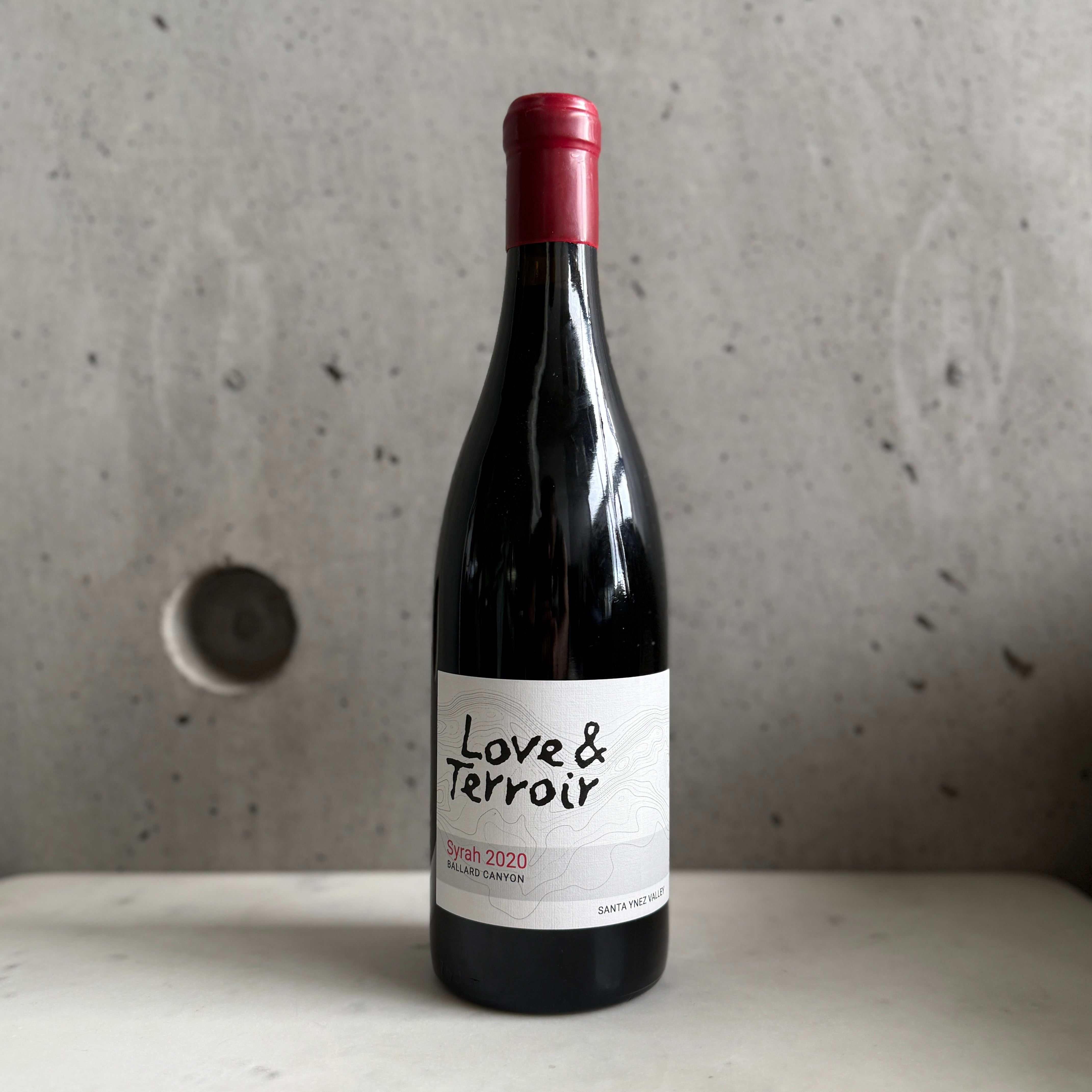2021 Love & Terroir Syrah on a concrete surface